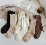 Cozy knit crew socks lineup showing the cable knit texture